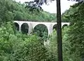 Le viaduc du Saillard en été. Section de ligne de Morez à Saint-Claude