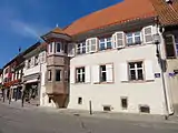 Maison (XVIIe-XIXe),1 place du Marché.