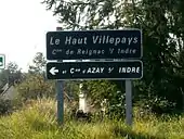 double panneau indicateur d'un hameau partagé entre deux communes