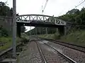 Le pont-rail de l'ancienne Ligne de Gray à Saint-Jean-de-Losne, coupant la ligne de Dijon-Ville à Vallorbe (frontière)