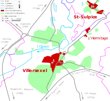 Vue d'une carte en couleur représentant les étapes de développement du bâti d'un bourg.