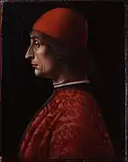 Portrait d'un homme vêtu de rouge, tourné vers la gauche.