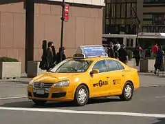 Un taxi Volkswagen Jetta TDI.