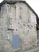 Grange dans des bâtiments de l'ancien prieuré.