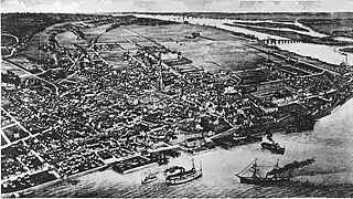Vue en plongée sur la cité des Trois-Rivières vers 1881.