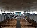 Photographie montrant l'intérieur de l'église du Sacré-Cœur de Bonnecousse, prise depuis la tribune de l'orgue