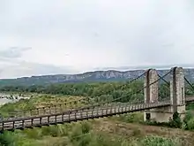 Pont suspendu sur la Durancemaison de gardien, toiture