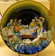 Le repas des dieux de l'Olympe. Assiette peinte attribuée à Nicola da Urbino, vers 1530.