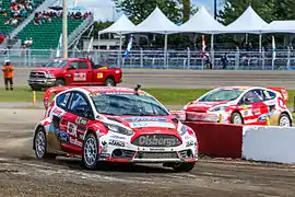 Andreas Bakkerud (avant) et Reinis Nitišs au Round 7 du Championnat du monde de rallycross FIA 2015 au Circuit de Trois-Rivières, Canada.