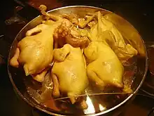 Cuisson de poulets Wenchang de la province de Hainan, en Chine.