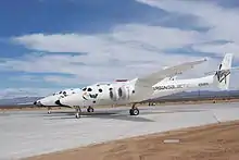  Un White Knight Two transportant un SpaceShipTwo à Spaceport America.