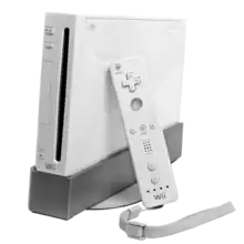 Console de jeu vidéo Wii, boitier blanc, avec une manette de jeu.