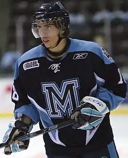 Photographie couleur d'un joueur de hockey sur glace