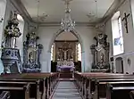 Vue intérieure de la nefvers le chœur.