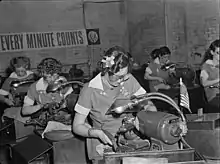 Women in industry. Tool production. À job which was formerly done by hand (and by men) is done in this large Midwest drill and tool plant by women at machines. These young workers are putting precision-ground points on drills which will be used in production of America's ships, tanks and guns. It takes at least four months to train these young women in the operation of these machines, but at the end of that period their work is speedy and efficient, and this company has found that both production and the quality of the drill points have improved. Republic Drill and Tool Company, Chicago, Illinois.