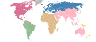 Carte stylisée du monde sur laquelle chaque zone continentale possède sa propre couleur.