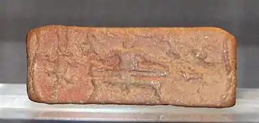 Empreinte de sceau représentant la figure divine assise dans une posture de yogi. Mohenjo-daro, Ashmolean Museum.