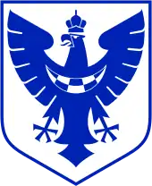 Un blason représentant un aigle bleu couronné sur fond blanc.