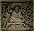 Les assauts de Mâra (les armées de Mâra). Relief sur schiste, 52,6 × 59 cm. Gandhara, IIIe siècle. Musée d'art asiatique de Berlin Dahlem.