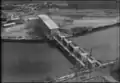Le barrage et la centrale hydroélectrique en construction en 1954.