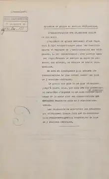 Copie d’une lettre dactylographiée en français, portant en haut à gauche un tampon en allemand, avec une date et un numéro.