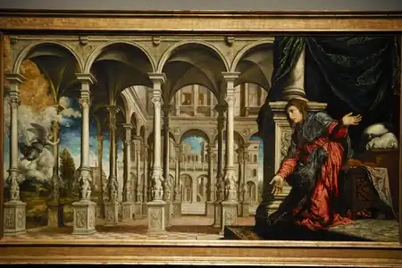 Peinture. L'ange arrive au second plan dans un vaste complexe de colonnes, Maris étant placée au premier plan à droite.